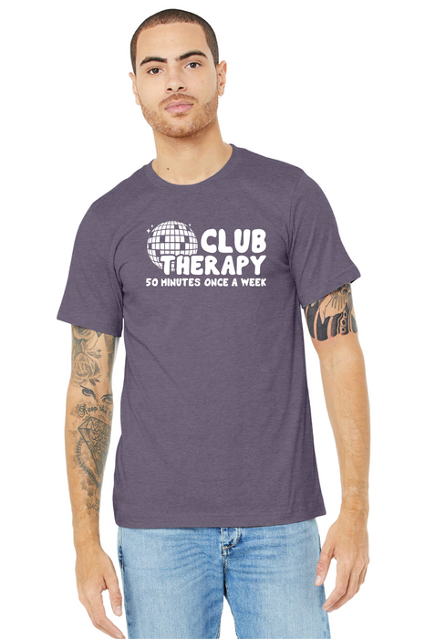 Man wearing a purple t-shirt with 'Club Therapy' text on a white background